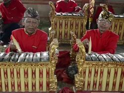 MS Gamelan musicians are playing traditional balinese Gamelan orchestra in asia AUDIO / Batubulan, Bali, Indonesia Stock Footage