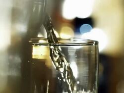 Beer poured to glass from can Stock Footage