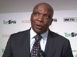 INTERVIEW - Howard Cross talks about how Topspin is a great way for kids to have the opportunity to having an education, his favorite teacher was his math teacher in Alabama, his golf game is hot but his table tennis game he'd like to leave uncommented Stock Footage