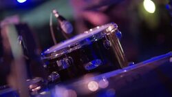 Skilled drummer plays with rock band at outdoor concert Stock Footage
