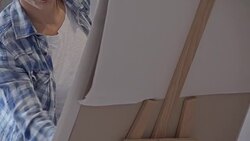 Woman artist drawing in art studio Stock Footage