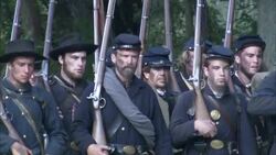 Union soldiers march with their rifles during the Civil War. Stock Footage
