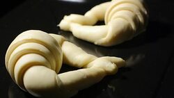 Fermenting and baking croissants Stock Footage