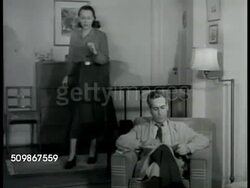 1948: MARRIAGE SOCIALIZING ARGUMENT: DRAMATIZATION: Bored housewife SOT talking on telephone accepting invitation to play Bridge, husband doesn't want to go, wife yelling saying she's going anyway, he yelling back. Instructional Video
