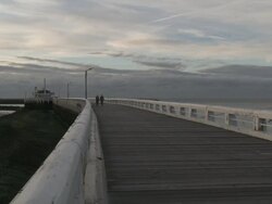 MS People walking on pier / Ostend, Flanders, Belgium  Stock Footage
