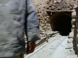 MS Shot of mine entrance with man entering at Potosi Mountains / Potosi, Bolivia Stock Footage