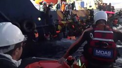 Migrants rescued from Mediterranean by MOAS - night rescue News Clip