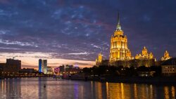 Russia, Moscow, Moskva river, Hotel Ukraine - one of the seven sister skyscrapers, built in Moscow at the end of Stalin's reign (early 1950s) - Time lapse Stock Footage
