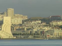 MS Panoramic view of "Padrao dos Descobrimentos" from Tagus River in Belem District / Lisbon, Portugal Stock Footage