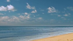 Beach scene showing sand, sea and sky Stock Footage