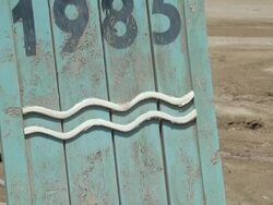 CU TU water level indicator at Dead Sea shore / Ein Gedi, Mechoz haDarom, Israel Stock Footage