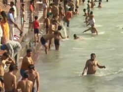 MS TU Crowd of people bath in Ganges river in public place / Haridwar, Uttarakhand, India Stock Footage