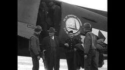 US government officials land at airfield in Germany at end of World War II to visit liberated concentration camp News Clip