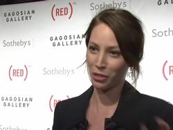 Bono and Damien Hirst Paint the Town Red For Aids In Africa - The (RED) Auction Stock Footage