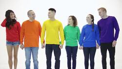 Gay pride group standing in unity holding hands in victory Stock Footage