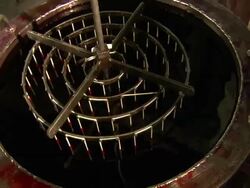 Medium Close Up static - A batch of candles dips into a vat of paraffin /  Missouri, United States Stock Footage