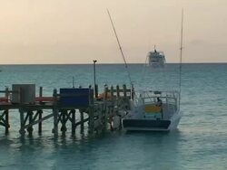 Fishing boat at the little wharf Stock Footage