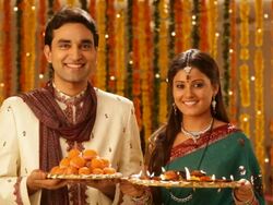 Portrait of a couple celebrating diwali festival Stock Footage