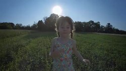 Girl Running In The Meadow At Sunset Stock Footage