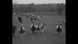Boy Scouts riding horses in rodeo in probably Jayhawk Area Council; scout on bucking steer News Clip