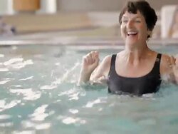 TU Exercisers doing water aerobics in pool / Vancouver, British Columbia, Canada Stock Footage