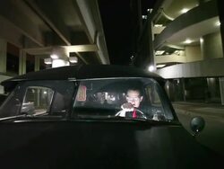 DS Driver in older model car driving under overpass  / Jacksonville, Florida, United States Stock Footage