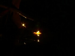  CU Candle floating in river at night / Varanasi, Uttar Pradesh, India Stock Footage