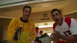 Medium shot of soccer players entering stadium &amp; cheering to camera (excited about game) Stock Footage