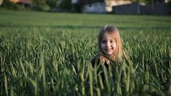 Girl enjoying the wheat field Stock Footage