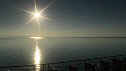 Arty shots of the sun's reflection off Sicily News Clip