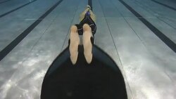 Freediver swimming underwater Stock Footage