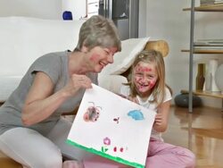 HD DOLLY: Funny Granny And Little Girl With Smeared Faces Stock Footage