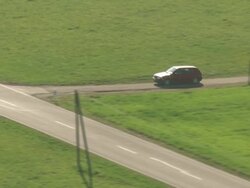 WS AERIAL TS View of car running on road parallel to landscape / Bisingen, Baden Wurttemberg, Germany Stock Footage