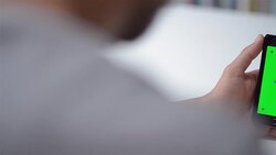 DOLLY SHOT: Chroma key on smart phone screen Stock Footage