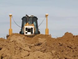 Bulldozer Pushing Dirt Stock Footage