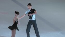 SLO MO Figure skating pair bowing to the audience Stock Footage