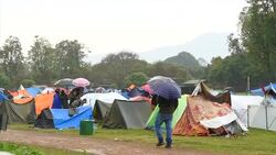 Displaced Residents in Temporary Camp News Clip