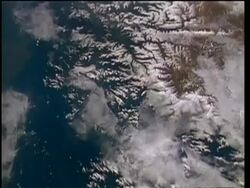 View of Earth from space, over Himalayas, mountains and lakes, STS-55 Stock Footage