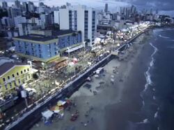 Aerial of the Carnabal de Salvador de Bahia with Lihgt house of Barra/ Circuito do Carnaval /orla /Farol da Barra /Salvador-Ba Stock Footage