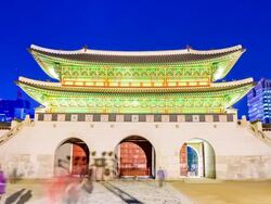 MS T/L View of People roaming Gwanghwamun gate in Gyeongbokgung royal palace(palace built in Chosun Dynasty) / Seoul, South Korea Stock Footage