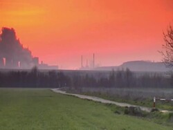 Industry at sunrise  (pan shot) Stock Footage