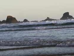 WS PAN SLO MO View of waves on rocky Pacific Northwest coast of Oregon / Astoria, Oregon, United States  Stock Footage