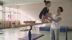 4K: Girl exercising on uneven bars. Stock Footage