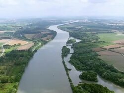 WS AERIAL View of river, field area at Aigues Mortes city / Languedoc Roussillon, France Stock Footage