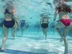 Women training aqua aerobic in swimming pool Stock Footage