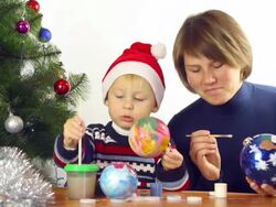 family paints Christmas toys Stock Footage