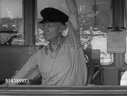 1952: MONONGAHELA RIVER: HA WS Greenfield bend along the Mon river. VS Captain Bill Cunningham sounding horn, operating levers, in the pilot house of the Shannopin diesel towboat, the Shannopin navigating w/ coal barges around bend of river. Instructional Video