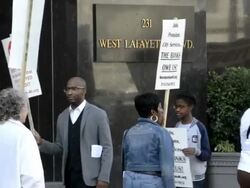 Protesters picket outside Detroit bankruptcy court Stock Footage