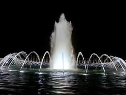Static shot of the World War II Memorial fountain in Washington DC at night Stock Footage