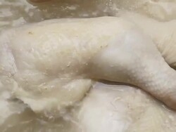 Boiling chicken. Stock Footage